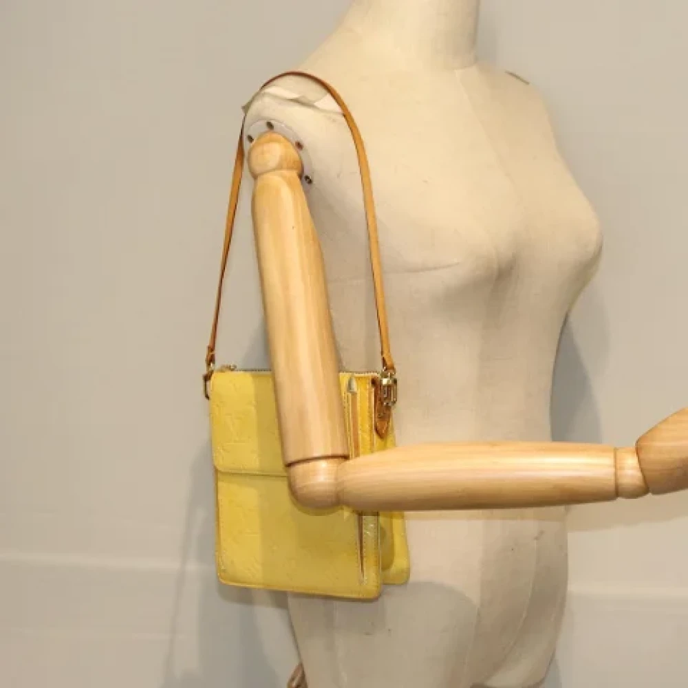 Louis Vuitton Vintage Pre-owned Leather clutches Yellow Dames
