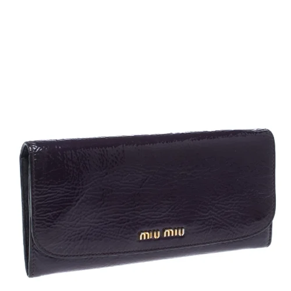 Miu Pre-owned Leather wallets Purple Dames