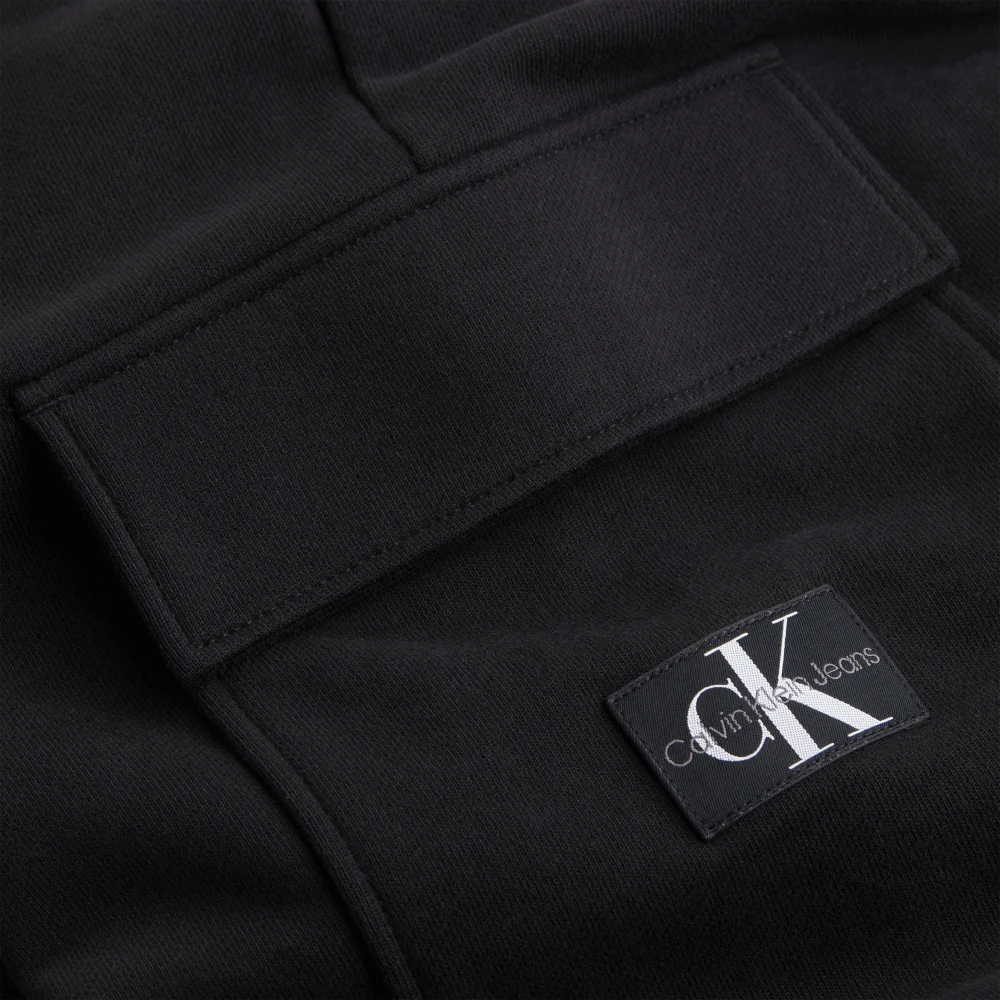 Calvin Klein Zwarte katoenen joggers met iriserend logo Black Dames