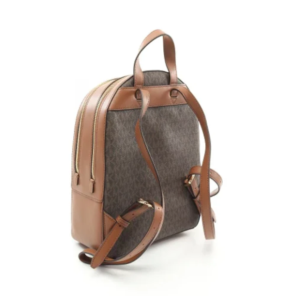 Michael Kors Pre-owned Canvas backpacks Brown Dames