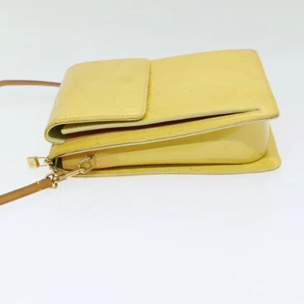 Louis Vuitton Vintage Pre-owned Leather clutches Yellow Dames