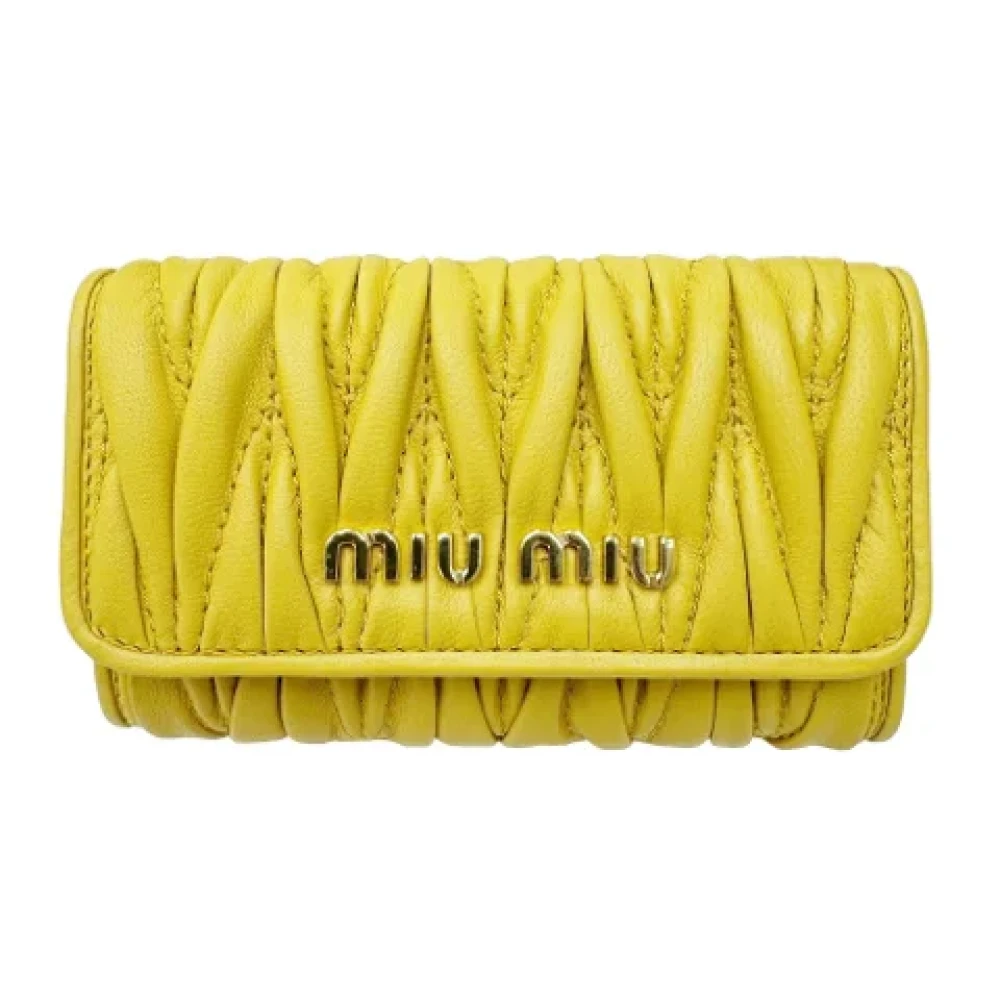 Miu Pre-owned Leather key-holders Yellow Dames