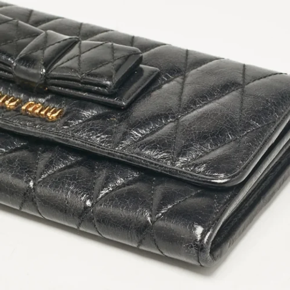 Miu Pre-owned Leather wallets Black Dames