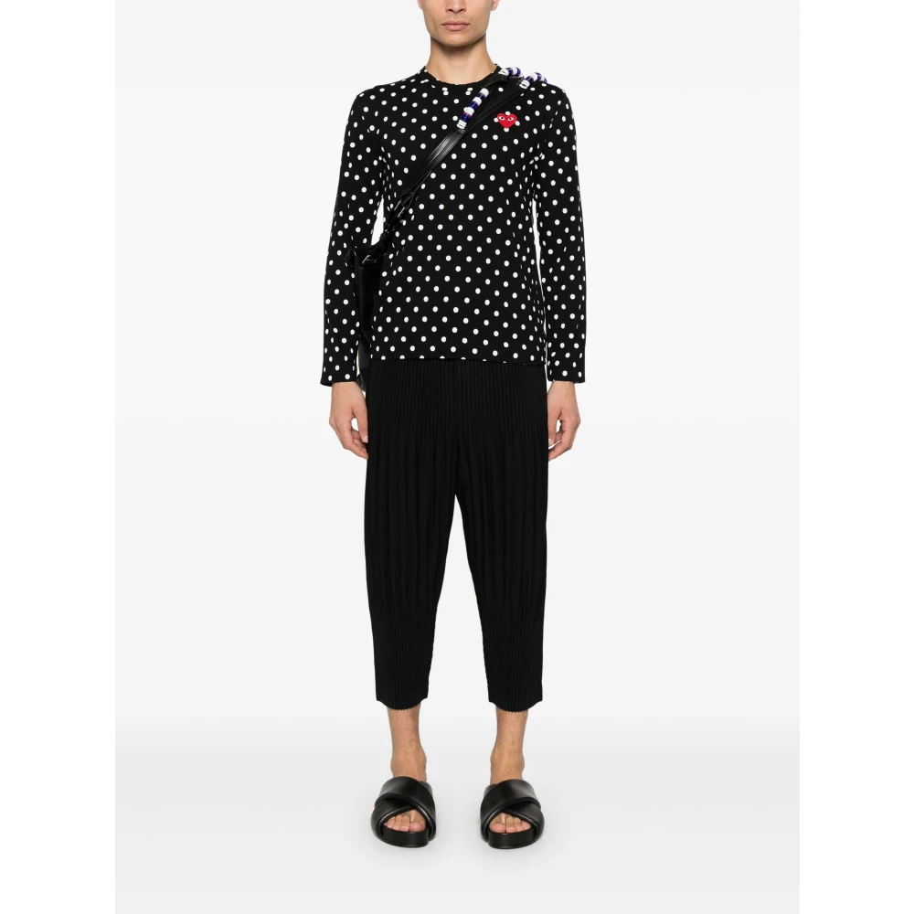 Issey Miyake Zwarte Plissé Tapered Broek Black Heren