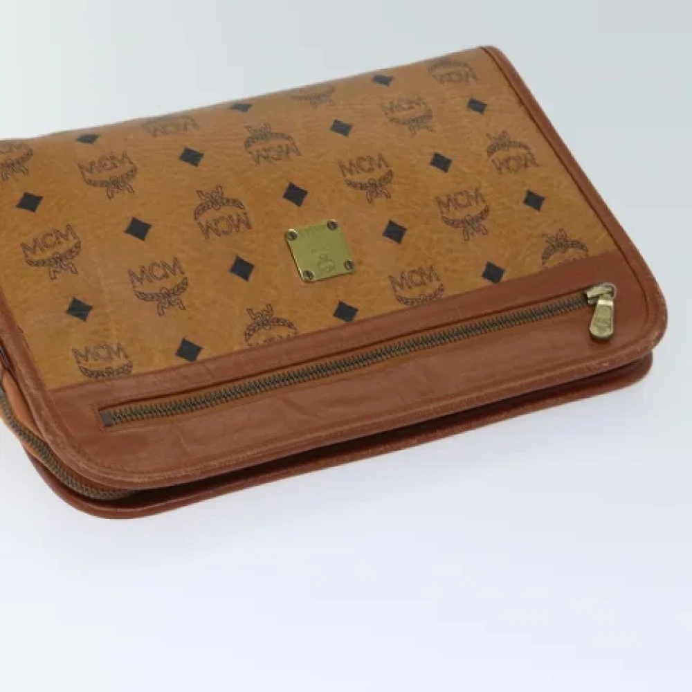 MCM Pre-owned Leather clutches Brown Dames