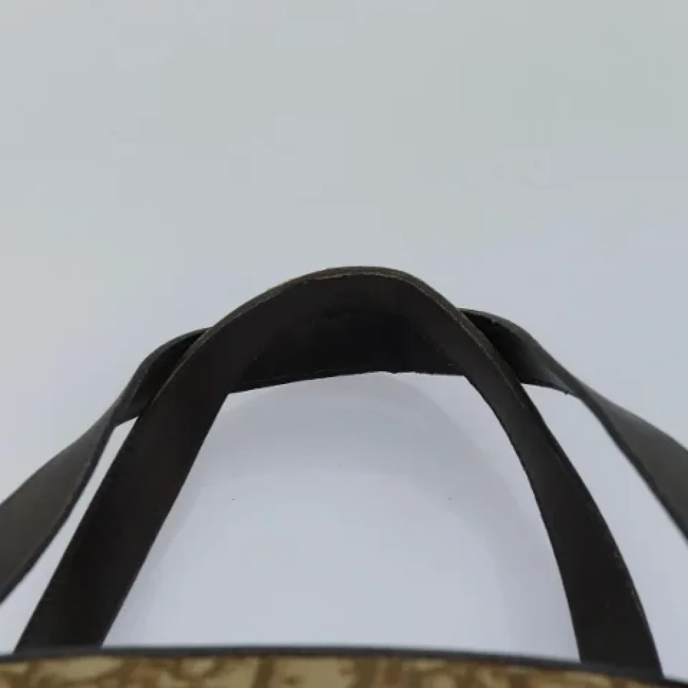 Dior Vintage Pre-owned Canvas handbags Brown Dames