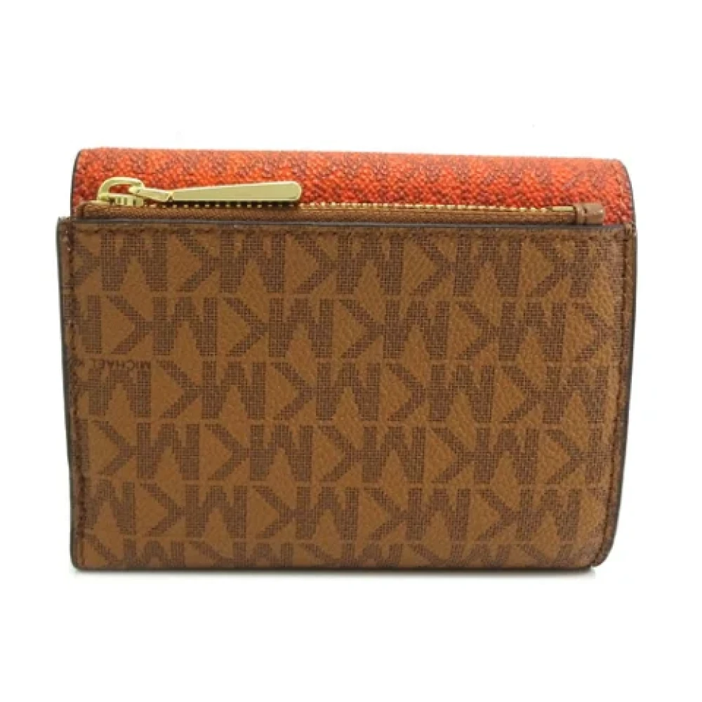 Michael Kors Pre-owned Canvas wallets Brown Dames