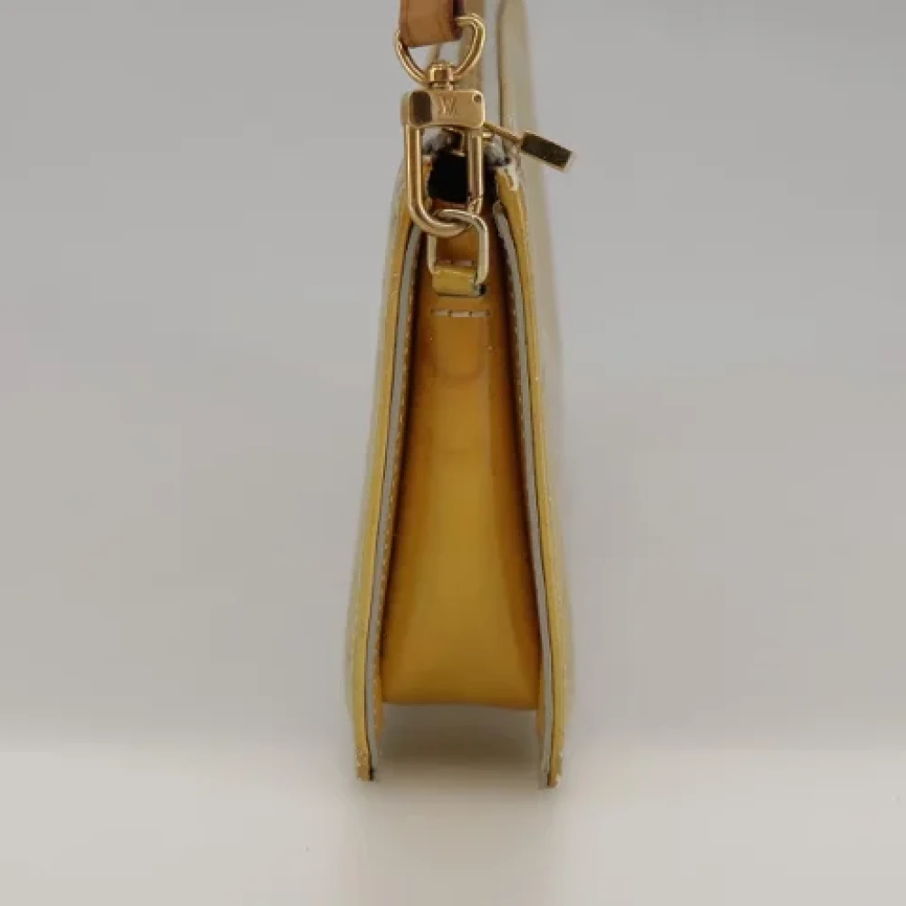 Louis Vuitton Vintage Pre-owned Leather pouches Beige Dames