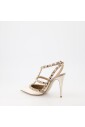 rockstud-pointed-toe-caged-pumps