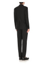 black-wool-suit-with-iconic-pin