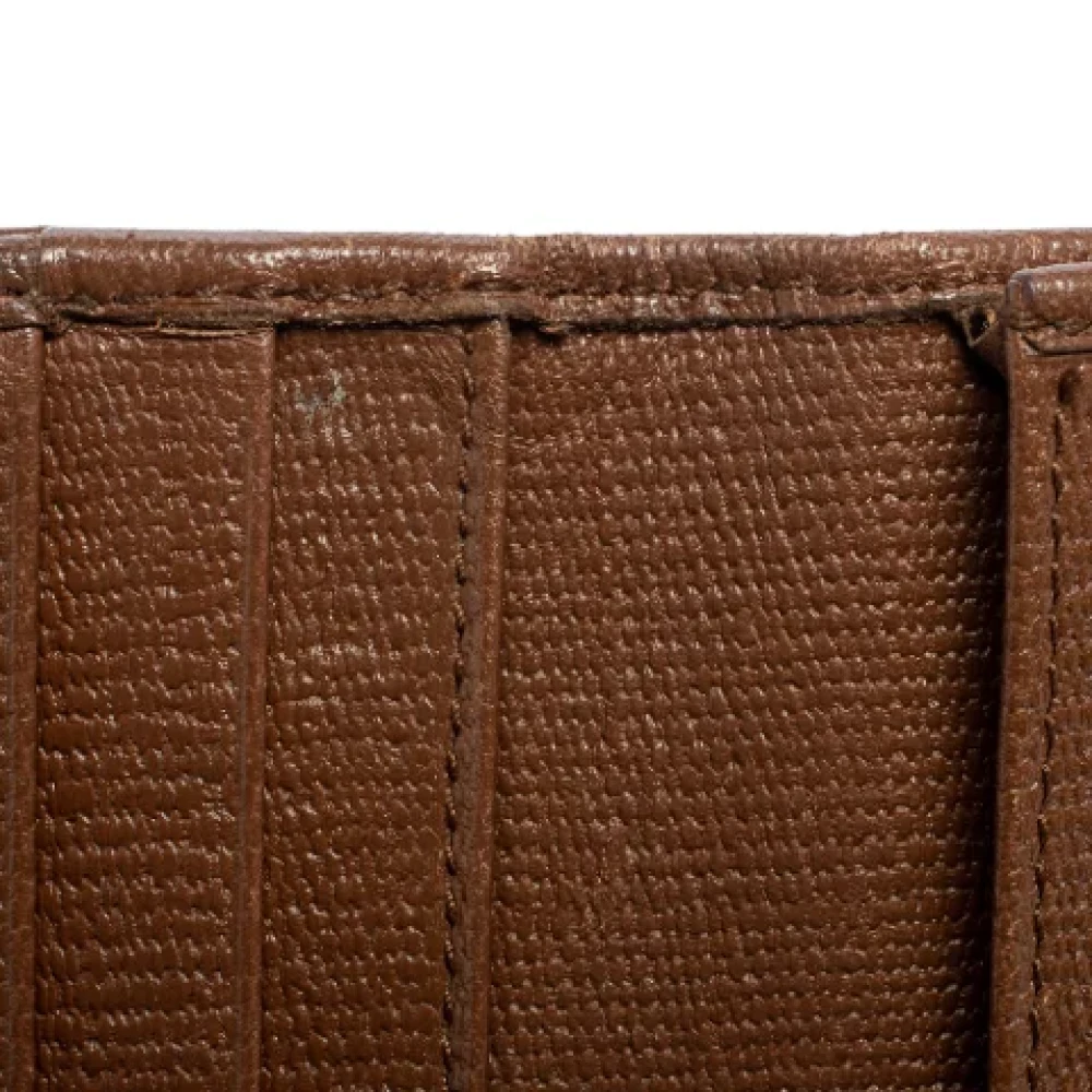 Yves Saint Laurent Vintage Pre-owned Leather wallets Brown Dames
