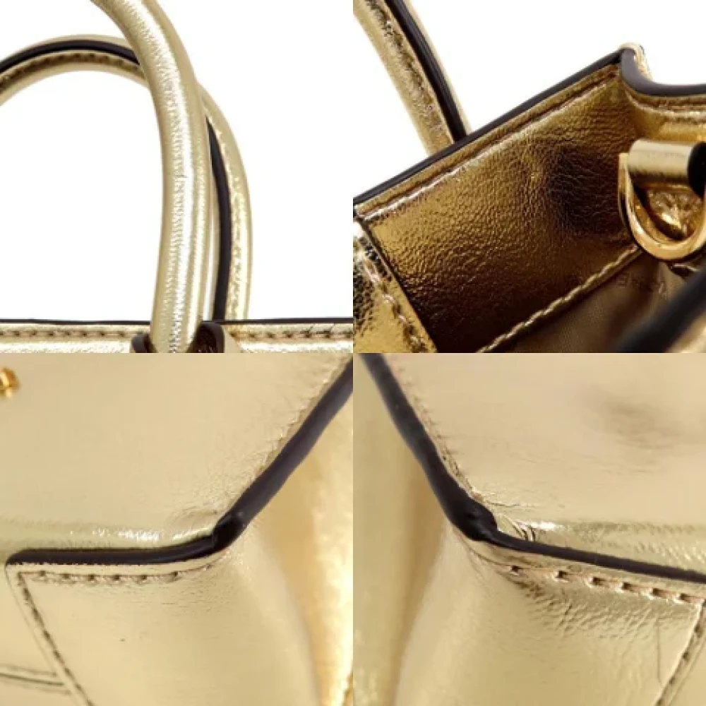 Michael Kors Pre-owned Plastic handbags Yellow Dames