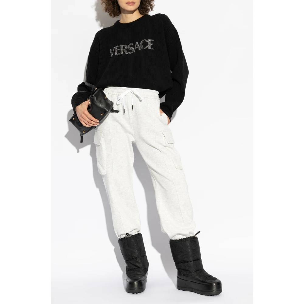 Versace Trui met logo afgewerkt met glinsterende kristallen Black Dames
