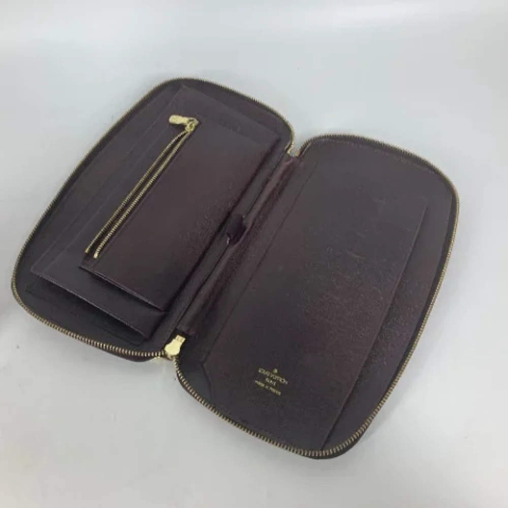 Louis Vuitton Vintage Pre-owned Leather wallets Red Dames