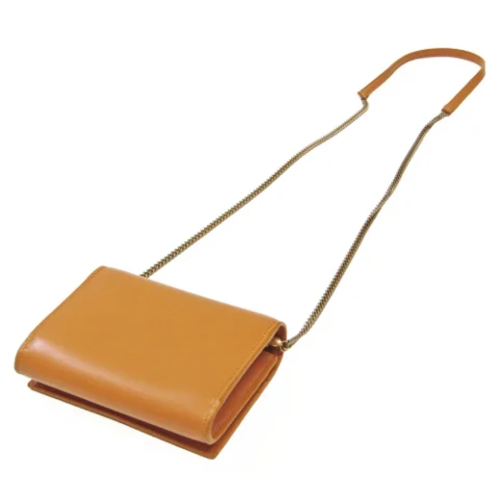 Yves Saint Laurent Vintage Pre-owned Leather wallets Orange Dames