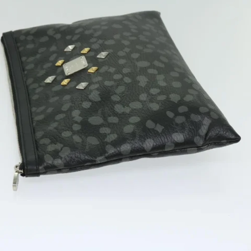 MCM Pre-owned Leather clutches Black Dames