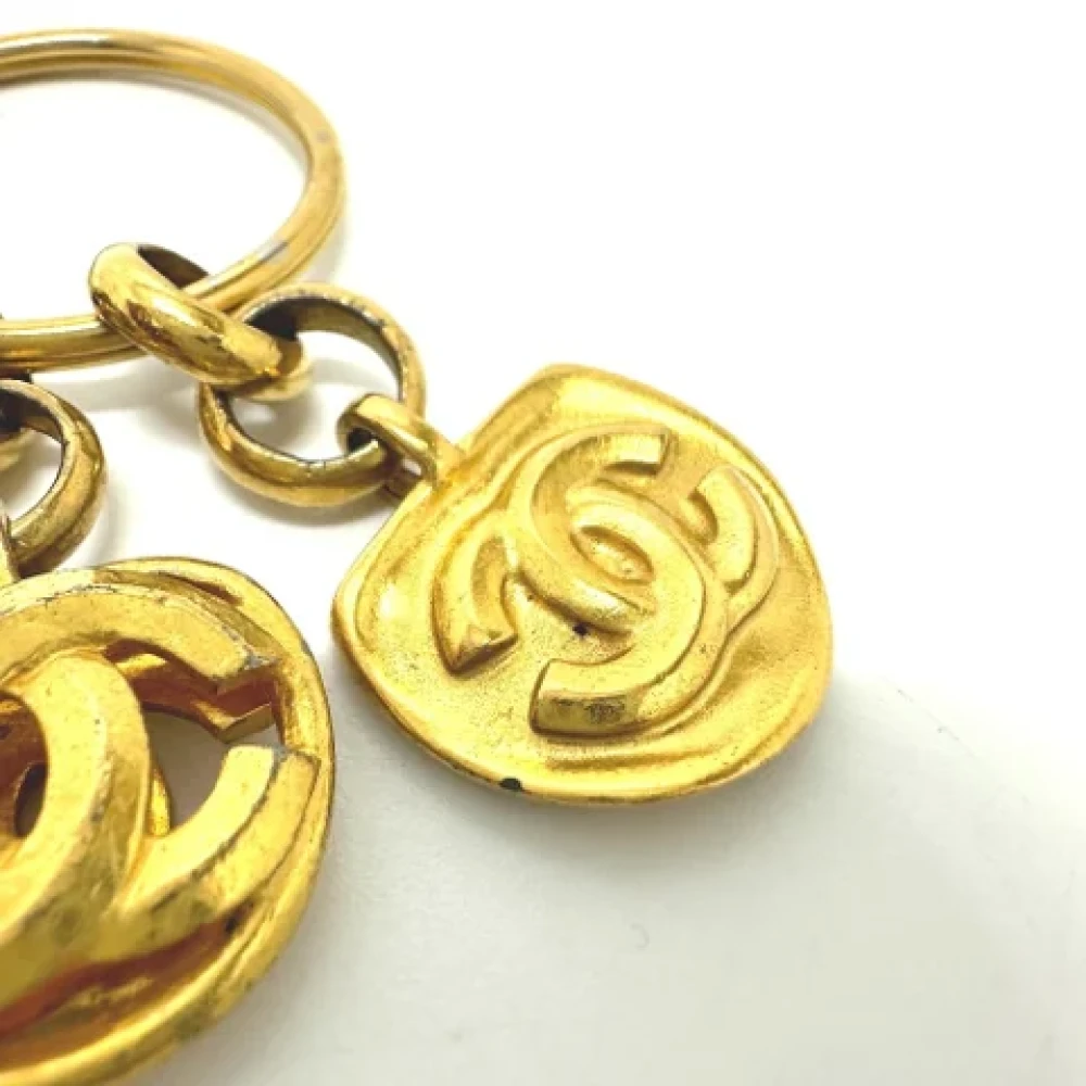Chanel Vintage Pre-owned Metal key-holders Yellow Dames