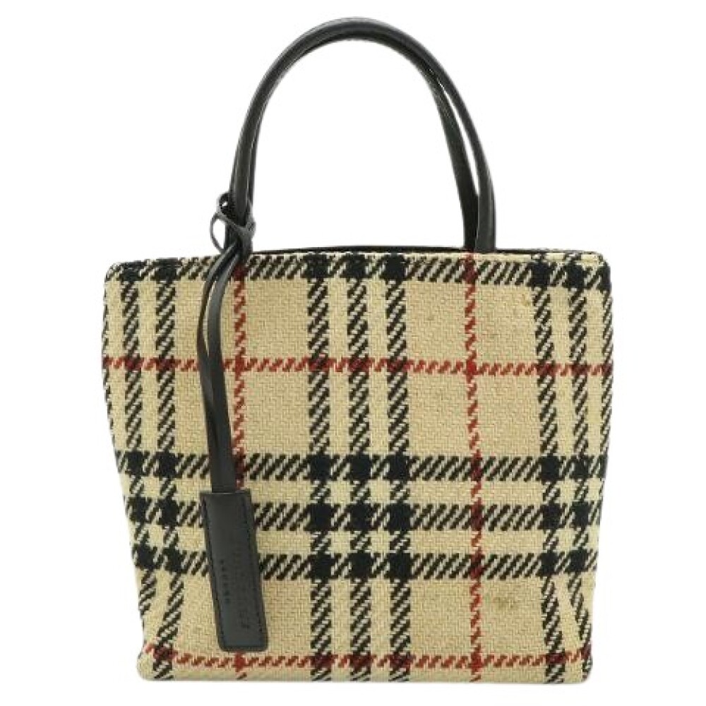Shop fashion from Burberry Vintage online on Miinto