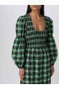 robe-midi-vert-a-smocks-et-jupe-a-volants