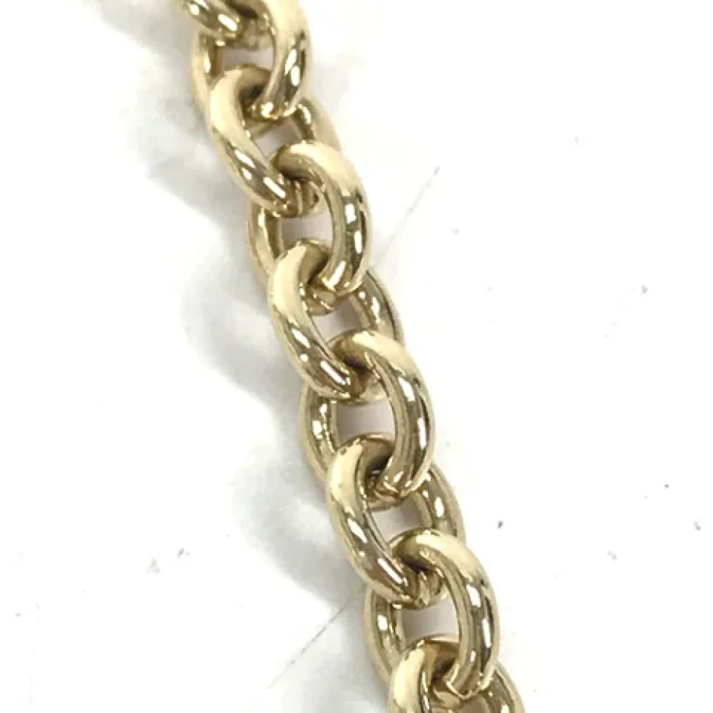 Miu Pre-owned Metal key-holders Yellow Dames