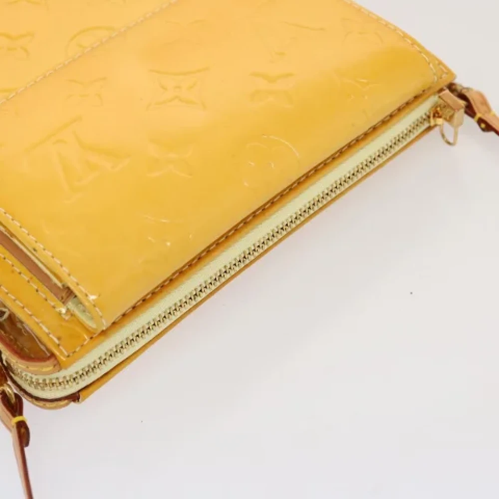 Louis Vuitton Vintage Pre-owned Leather clutches Yellow Dames