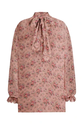 Blus med rosett och rosmönster