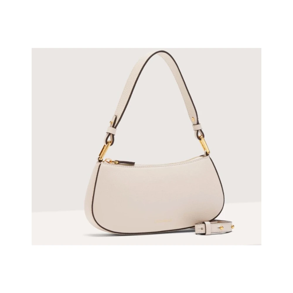Coccinelle Schoudertas van generfd leer met metalen detail White Dames