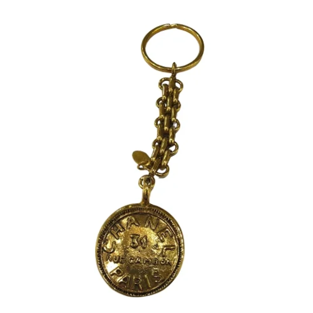 Chanel Vintage Pre-owned Metal key-holders Yellow Dames