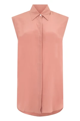 Elegant och mångsidig rosa ärmlös skjorta.