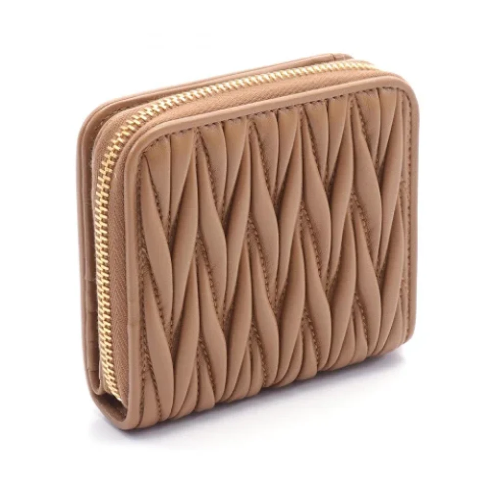 Miu Pre-owned Leather wallets Brown Dames