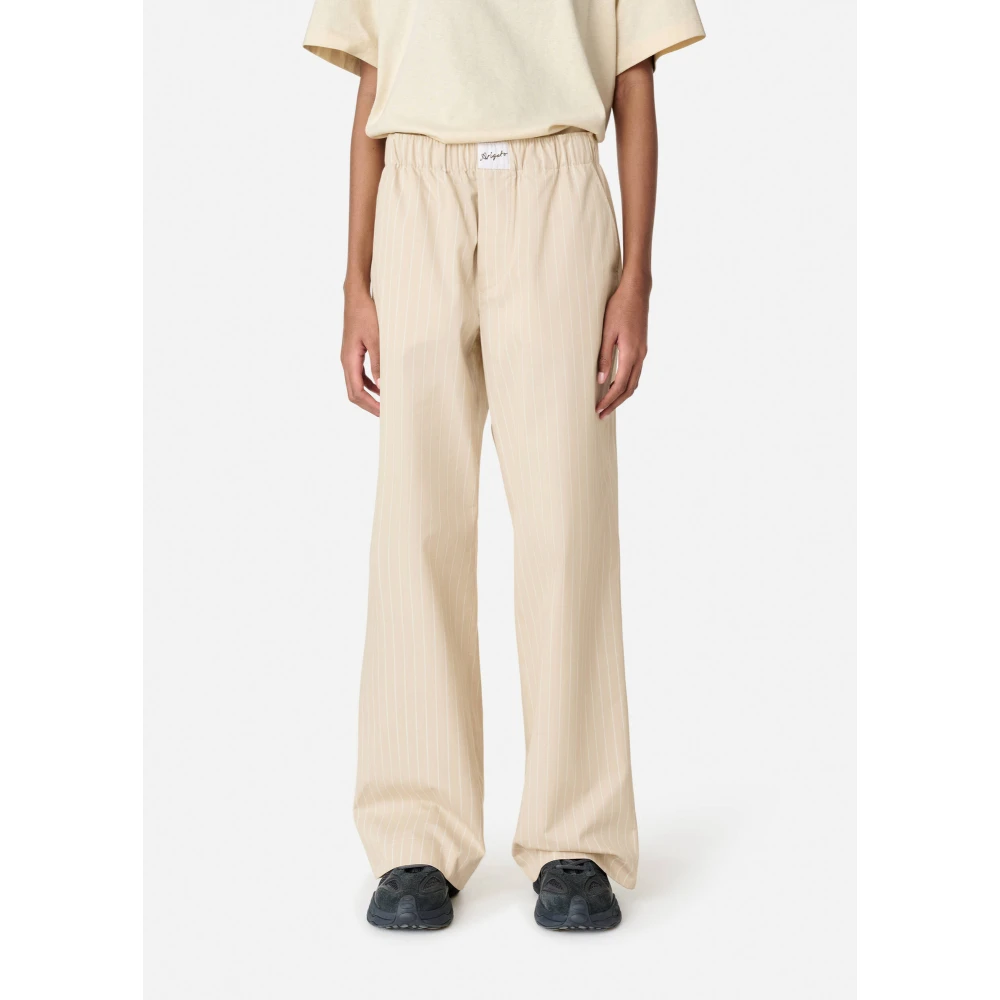 Axel Arigato Gestreepte katoenen broek Beige Dames