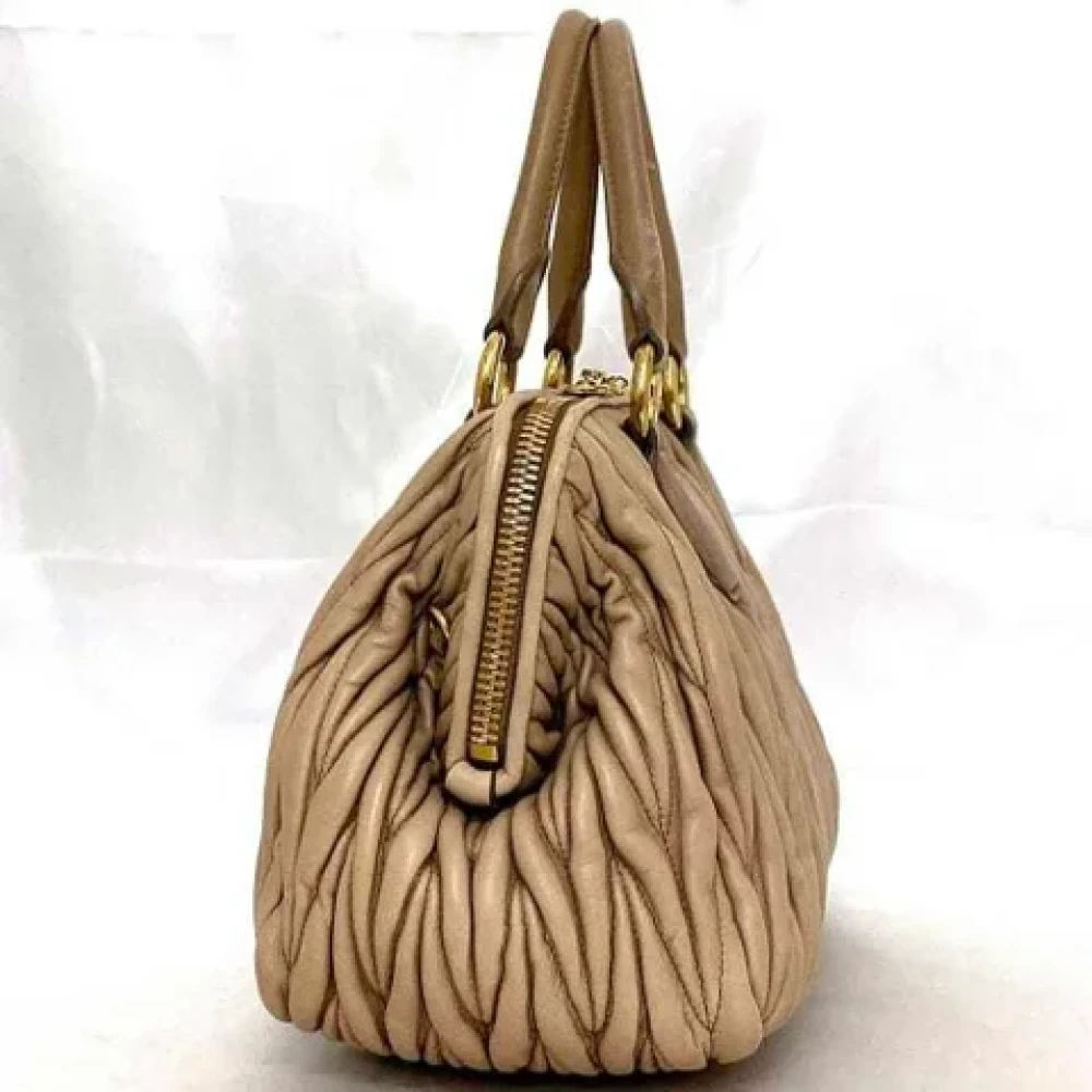 Miu Pre-owned Leather handbags Beige Dames
