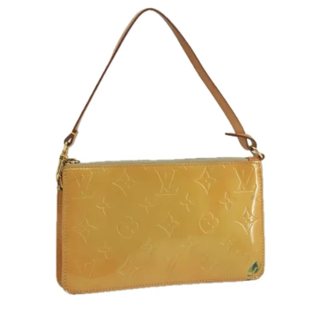 Louis Vuitton Vintage Pre-owned Leather pouches Beige Dames