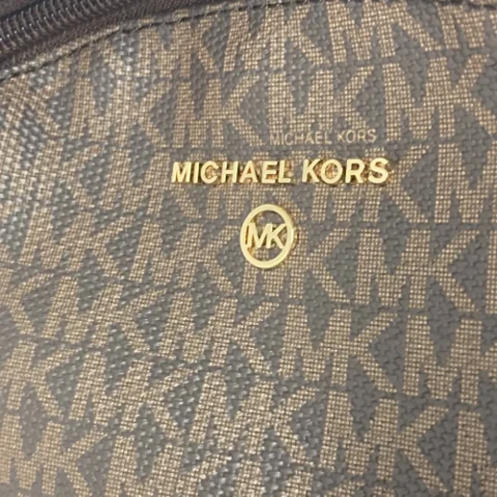 Michael Kors Pre-owned Canvas backpacks Brown Dames