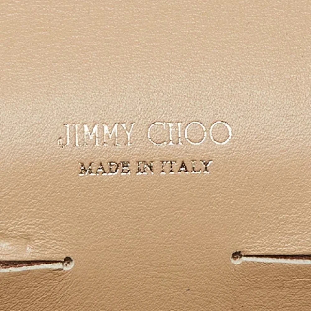 Jimmy Choo Pre-owned Leather clutches Beige Dames