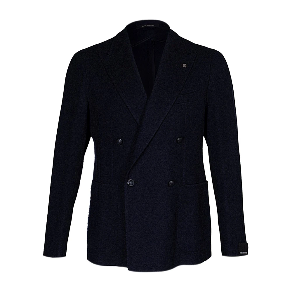 Herre blazer. Dobbeltspent modell med peak-revers. Normal passform. Påsydd lomme. Teksturert stoff. Laget i Italia