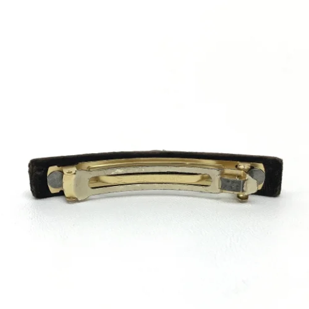 Louis Vuitton Vintage Pre-owned Metal hair-accessories Brown Dames