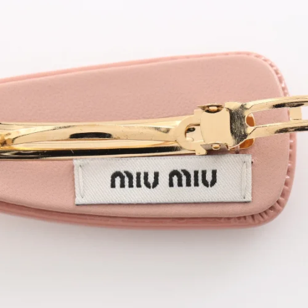 Miu Pre-owned Leather hair-accessories Pink Dames
