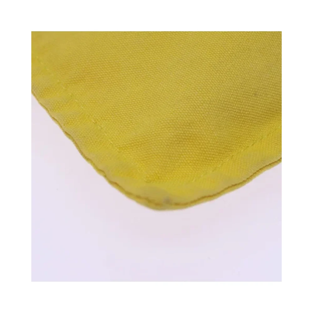 Hermès Vintage Pre-owned Canvas pouches Yellow Dames