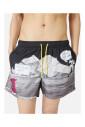 boxer-de-bain-a-motifs-avec-fond-noir-et-cordon-jaune