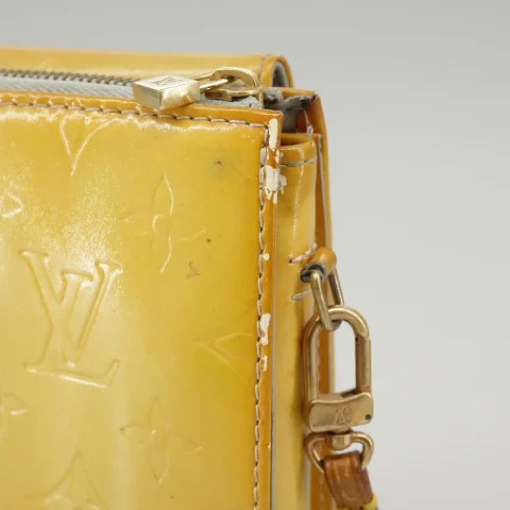 Louis Vuitton Vintage Pre-owned Leather pouches Yellow Dames