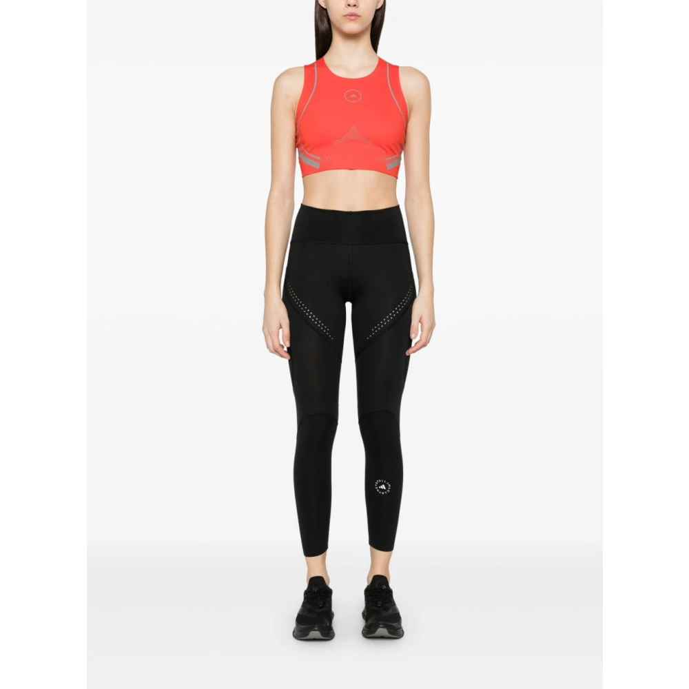 adidas by stella mccartney Zwarte joggingbroek met geperforeerde details Black Dames