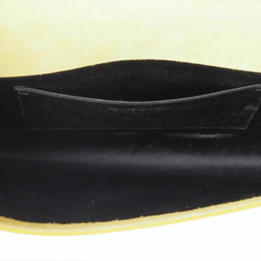 Yves Saint Laurent Vintage Pre-owned Leather clutches Yellow Dames