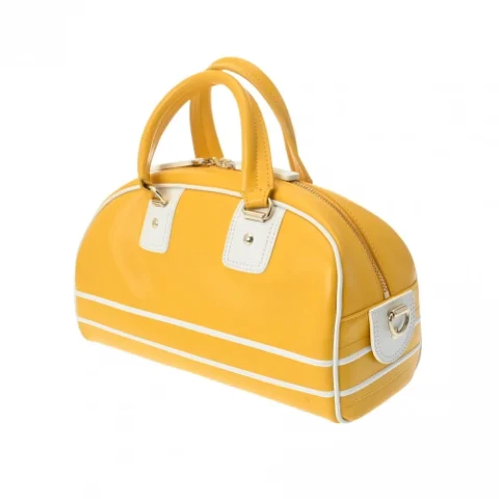 Dior Vintage Pre-owned Leather handbags Yellow Dames