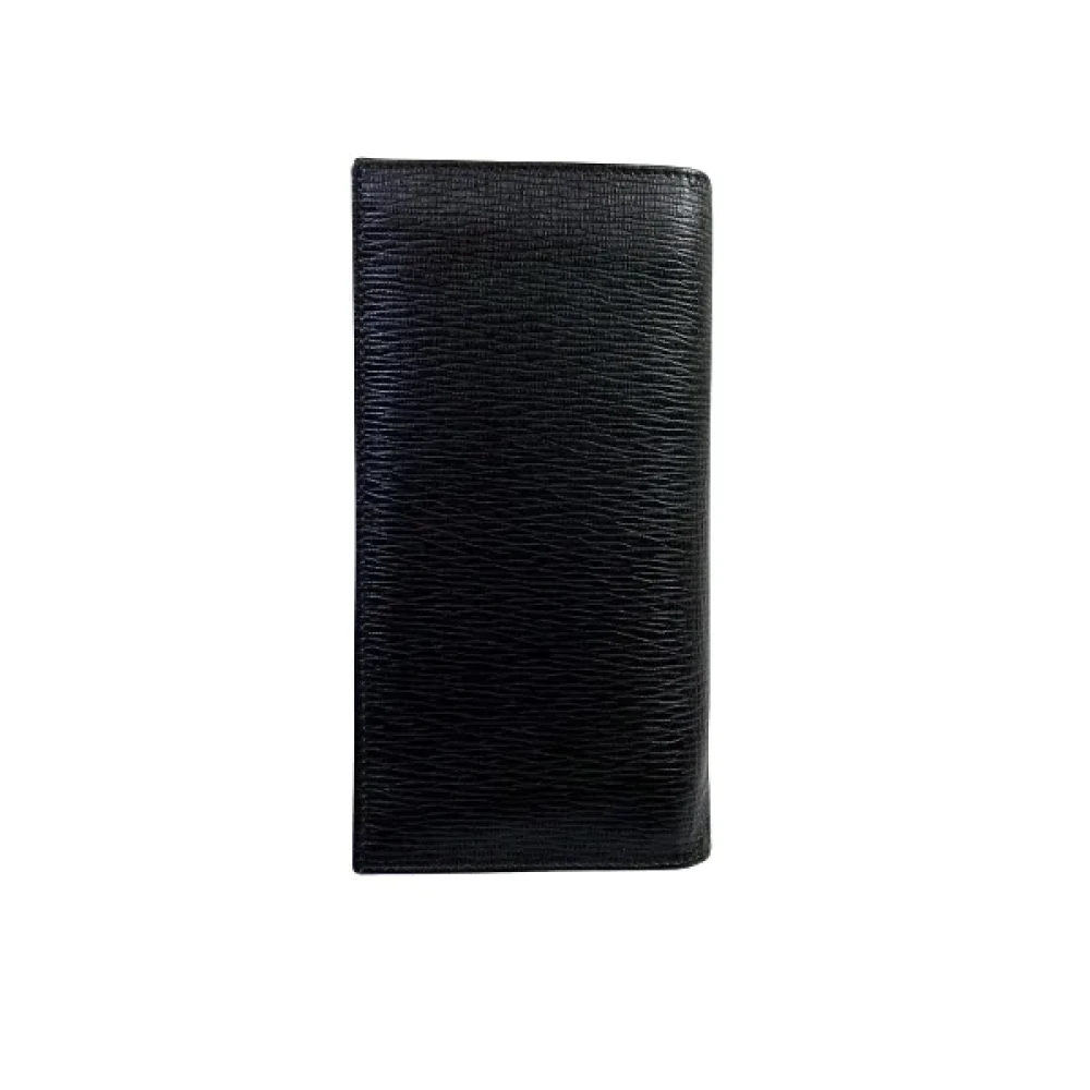 Salvatore Ferragamo Pre-owned Leather wallets Black Heren
