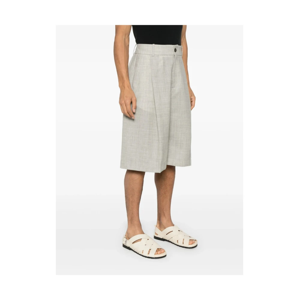 Studio Nicholson Beige Broek met Zakken en Knopen Gray Heren
