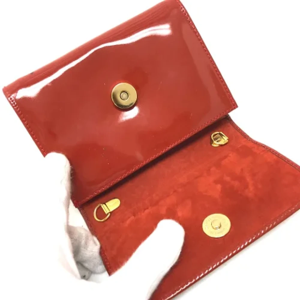 Salvatore Ferragamo Pre-owned Leather pouches Orange Dames
