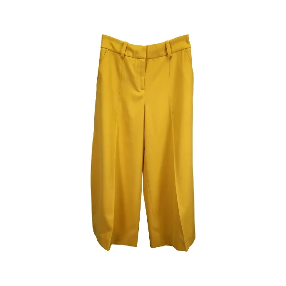 Oscar De La Renta Pre-owned Polyester bottoms Yellow Dames