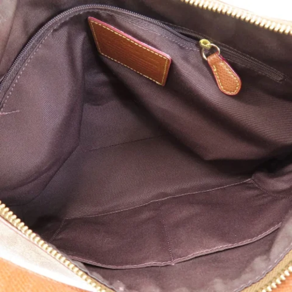 Coach Pre-owned Plastic handbags Brown Dames