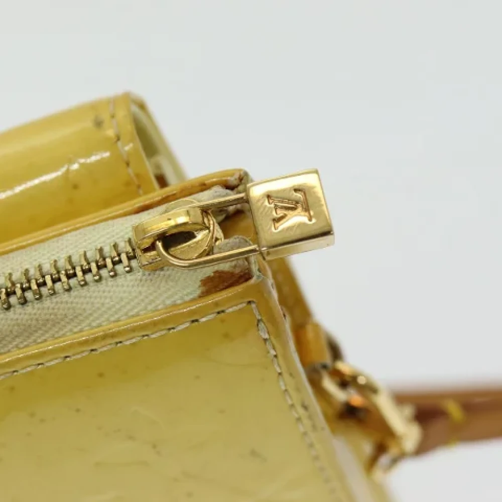 Louis Vuitton Vintage Pre-owned Leather clutches Yellow Dames